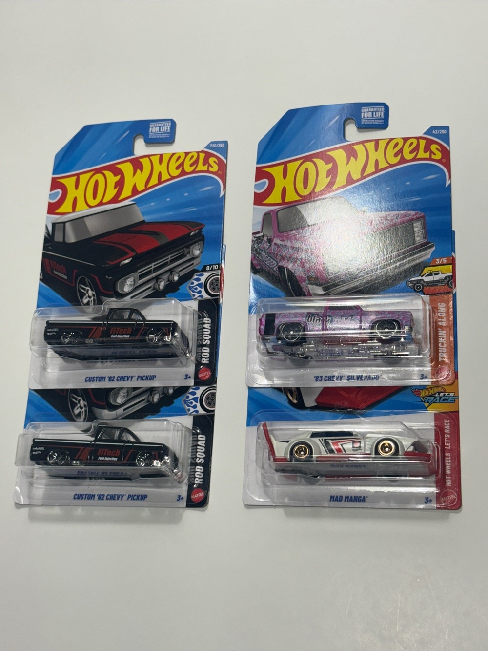 Unopened 64' Chevy Pickups 83' Chevy Silverado Mad Manga Hot Wheels 4-Pack Set